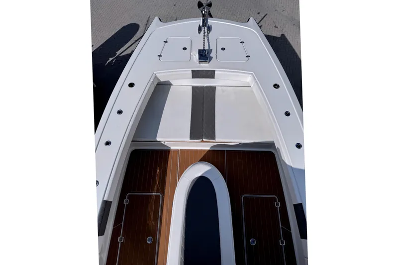 Slide: The Image of Freeman 34VH 2019 boat deck with wood and upholstery details. - 9