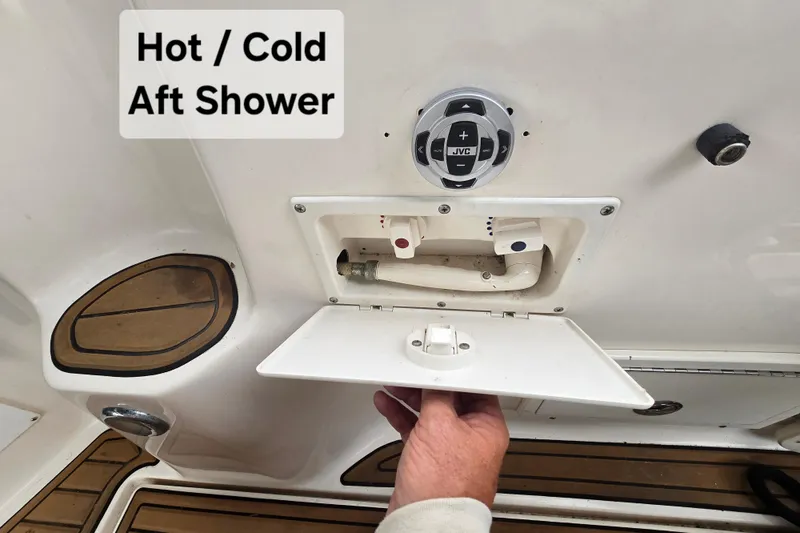 Slide: The Image of 2003 Rinker Fiesta Vee 342 boat with hot/cold aft shower and JVC control panel. - 20