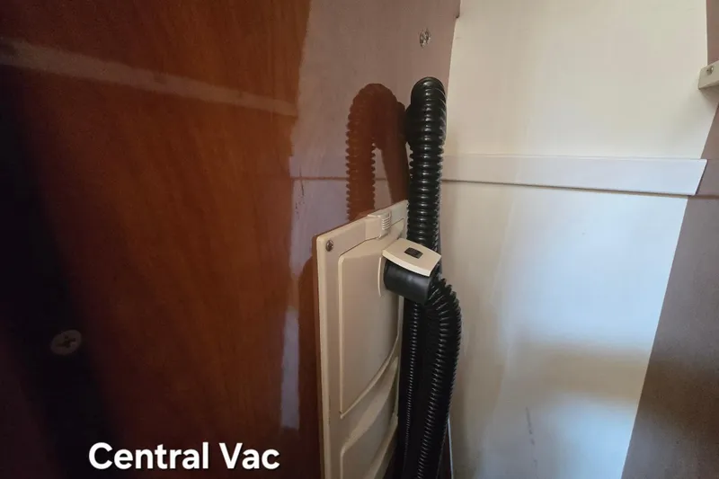 Slide: The Image of Central vacuum system in 2003 Rinker Fiesta Vee 342 boat interior. - 30