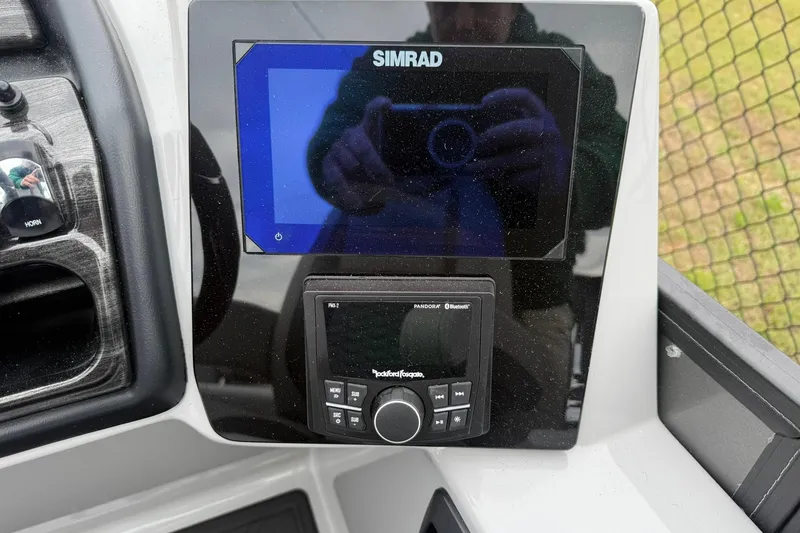Slide: The Image of Control panel of 2026 Bentley Pontoons Elite 253 Swingback with Simrad display. - 10