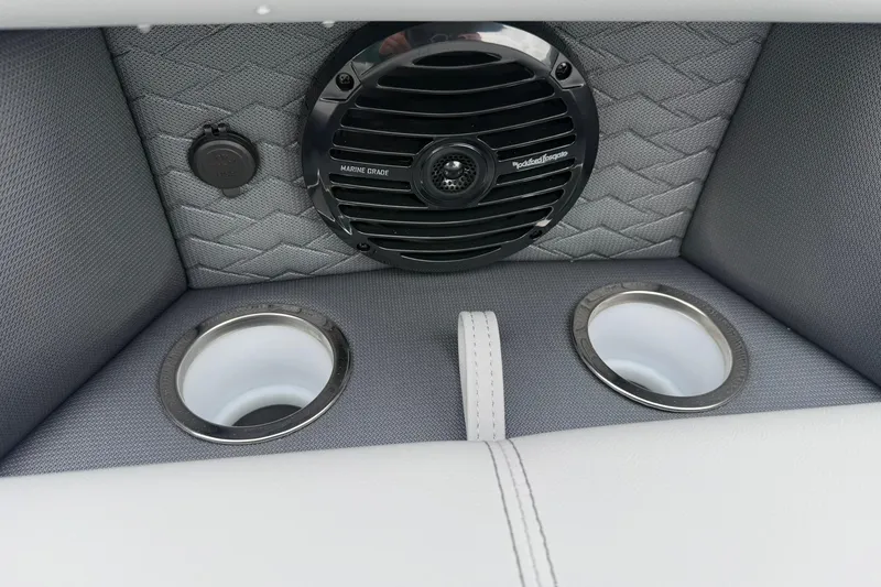 Slide: The Image of 2026 Bentley Pontoons Elite 253 Swingback interior with marine-grade speaker and cup holders. - 11