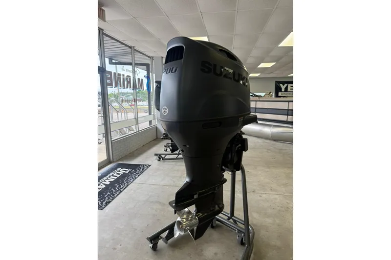 Slide: The Image of Suzuki outboard motor displayed indoors, suitable for Bentley Pontoons Elite 253 Swingback 2026. - 15