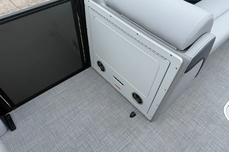Slide: The Image of Interior of 2026 Bentley Pontoons Elite 253 Swingback, featuring sleek seating and modern design. - 8