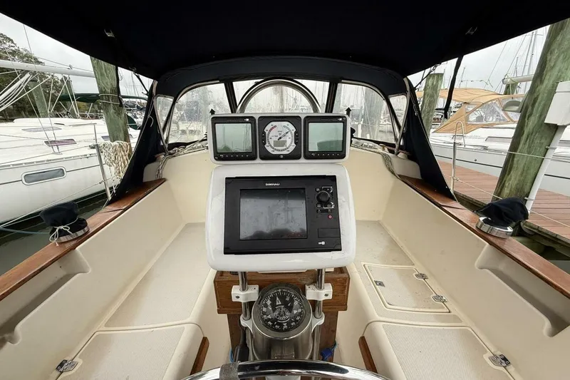 Slide: The Image of Cockpit of a 1992 Island Packet 29 sailboat with navigation instruments. - 7