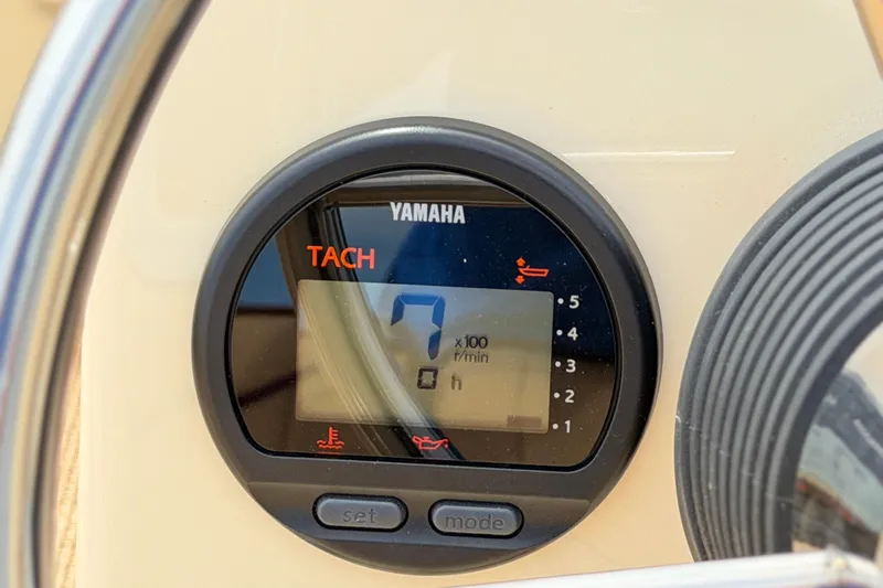 Slide: The Image of Yamaha tachometer on Rossiter 14 boat, displaying RPM, 2027 model. - 22