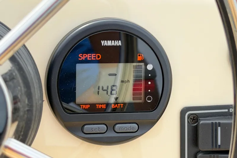 Slide: The Image of Yamaha speedometer on Rossiter 14 boat, displaying 14.8 mph, 2027 model. - 23