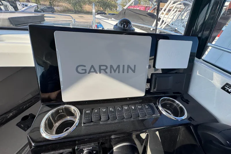 Slide: The Image of Dashboard of 2026 Jeanneau NC Sport 795 Series 2 with Garmin navigation system. - 18