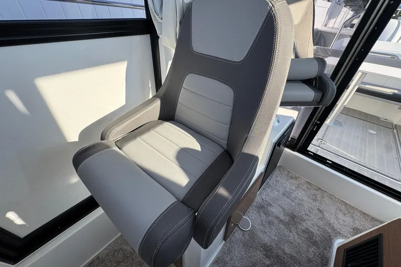 Slide: The Image of Luxury seating in the 2026 Jeanneau NC Sport 795 Series 2 boat interior. - 22