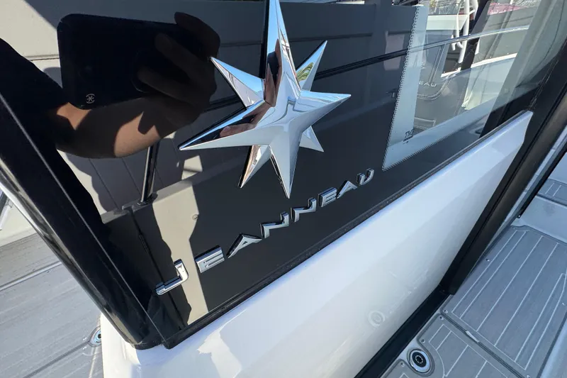 Slide: The Image of 2026 Jeanneau NC Sport 795 Series 2 boat, featuring sleek design and branding. - 28