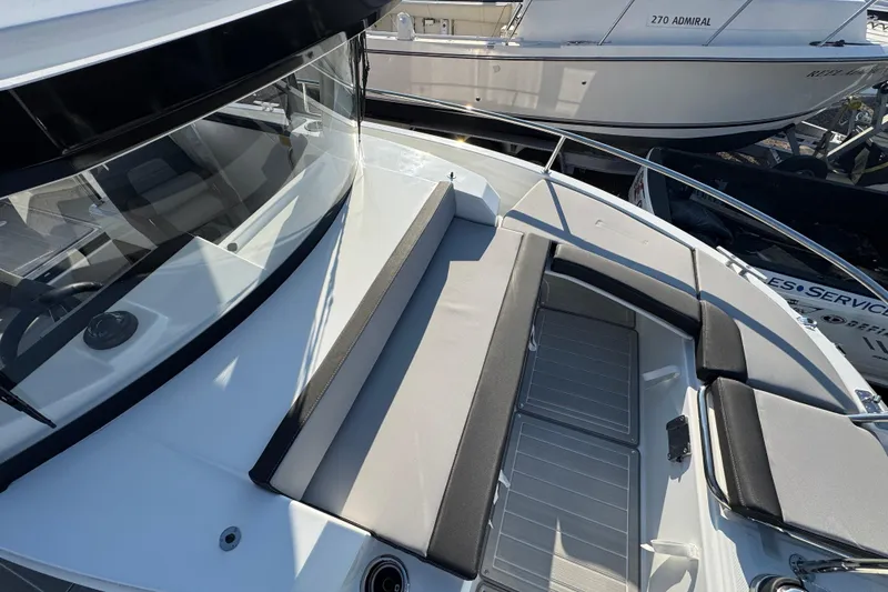 Slide: The Image of 2026 Jeanneau NC Sport 795 Series 2 boat with sleek deck design and comfortable seating. - 31