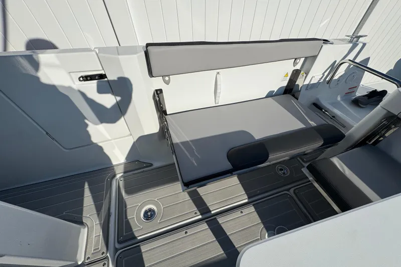 Slide: The Image of 2026 Jeanneau NC Sport 795 Series 2 boat interior with foldable seating and sleek design. - 5