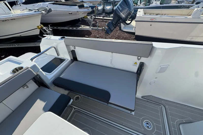 Slide: The Image of 2026 Jeanneau NC Sport 795 Series 2 boat interior with foldable seating and modern design. - 7
