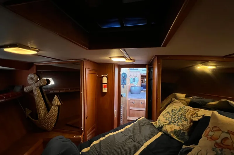 Slide: The Image of Cozy cabin interior of 1985 Heritage East 40 Sundeck Trawler with nautical decor. - 36
