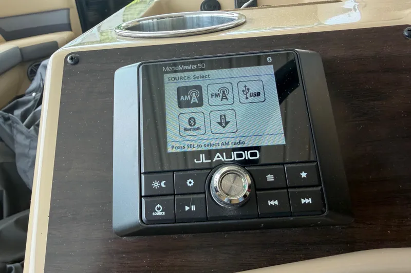 Slide: The Image of 2023 Harris Cruiser 250 CW audio system with JL Audio MediaMaster 50 interface. - 14