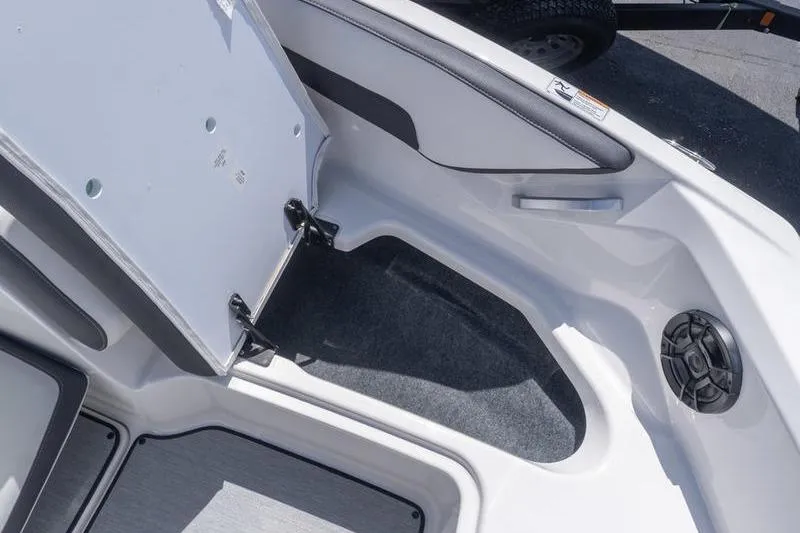 Slide: The Image of Interior view of a 2026 Yamaha Boats AR195, showcasing seating and speaker details. - 14