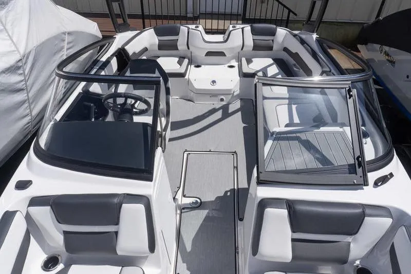 Slide: The Image of 2026 Yamaha Boats AR195 interior with sleek seating and modern design. - 16