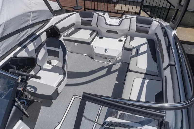 Slide: The Image of 2026 Yamaha Boats AR195 interior with spacious seating and modern design. - 17