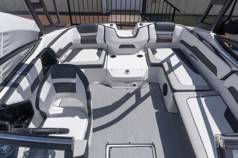 Slide: The Image of 2026 Yamaha Boats AR195 interior with spacious seating and modern design. - 18