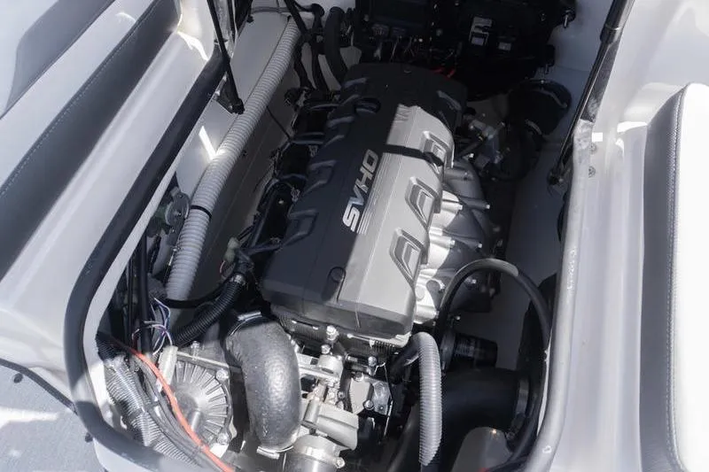 Slide: The Image of Engine compartment of 2026 Yamaha Boats AR195, featuring a powerful SVHO engine. - 24