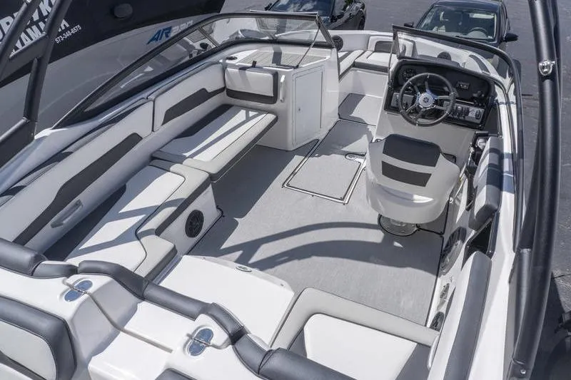 Slide: The Image of 2026 Yamaha Boats AR195 interior with sleek seating and modern dashboard design. - 5