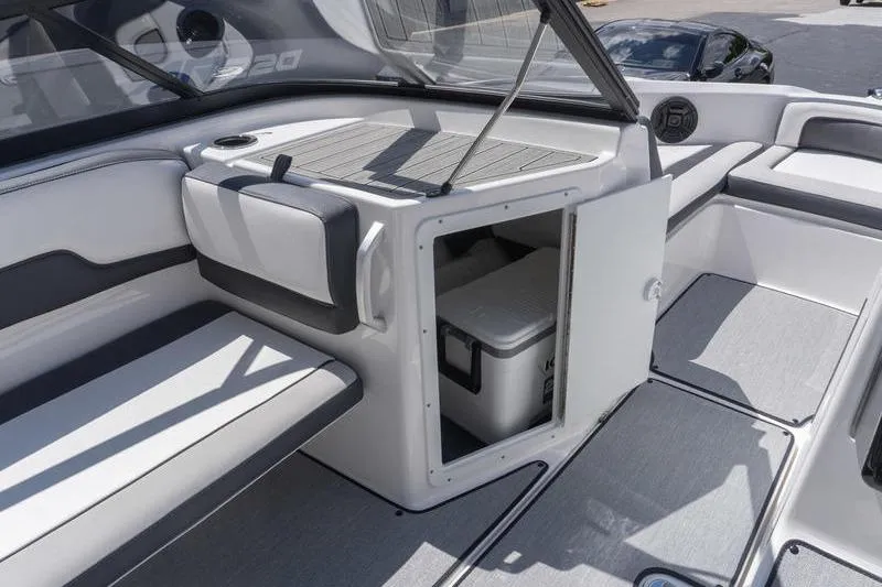Slide: The Image of 2026 Yamaha Boats AR195 interior with seating and storage compartment. - 8