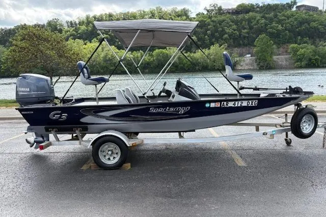 The Image of 2017 G3 Sportsman 1710 Vinyl boat on trailer by a scenic river. - 0
