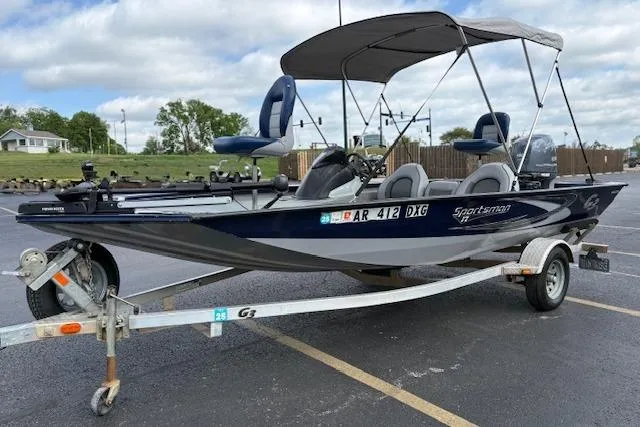 Slide: The Image of 2017 G3 Sportsman 1710 Vinyl fishing boat on trailer, parked outdoors. - 10