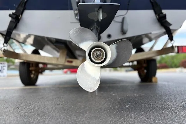 Slide: The Image of 2017 G3 Sportsman 1710 Vinyl boat propeller on trailer, close-up view. - 11