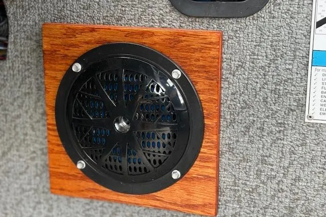 Slide: The Image of Speaker mounted on a wooden panel in a 2017 G3 Sportsman 1710 Vinyl boat. - 21