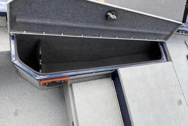 Slide: The Image of 2017 G3 Sportsman 1710 Vinyl boat storage compartment, open and empty. - 32