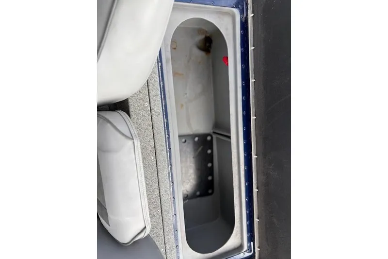 Slide: The Image of 2017 G3 Sportsman 1710 Vinyl boat storage compartment interior view. - 36