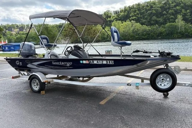 Slide: The Image of 2017 G3 Sportsman 1710 Vinyl boat on trailer by a lake. - 4