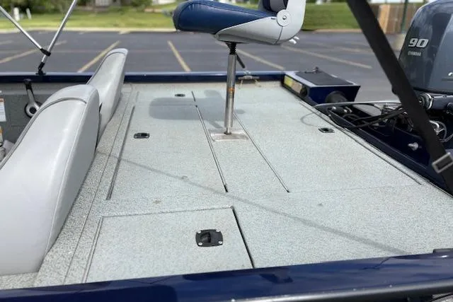 Slide: The Image of 2017 G3 Sportsman 1710 Vinyl boat deck with seating and Yamaha 90 engine. - 48