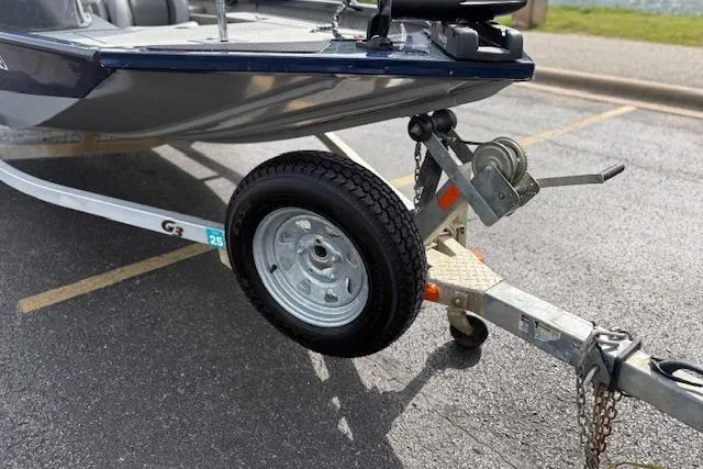 Slide: The Image of 2017 G3 Sportsman 1710 Vinyl boat on trailer in parking lot. - 50
