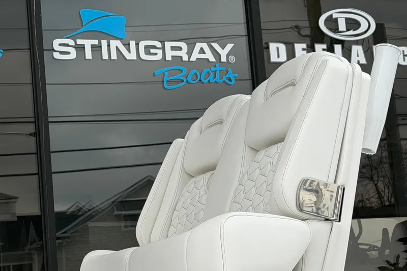 Slide: The Image of Luxury seating on a 2026 Tidewater 272 LXF boat, with Stingray Boats signage. - 4