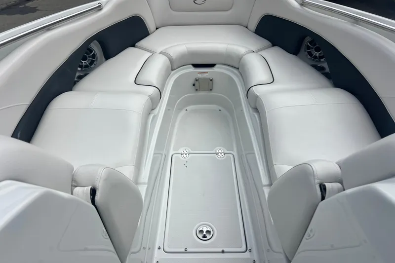 Slide: The Image of Luxurious interior of 2018 Crownline 285 SS boat with white seating and sleek design. - 13