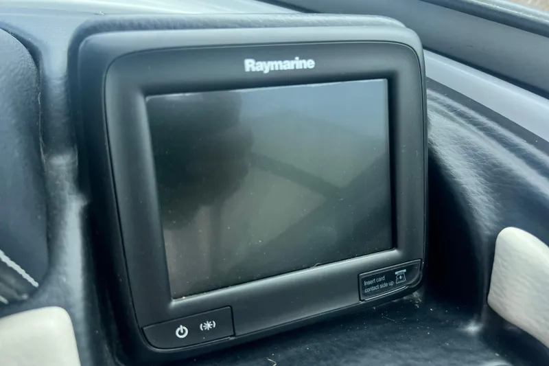 Slide: The Image of Raymarine display on 2018 Crownline 285 SS boat dashboard. - 15