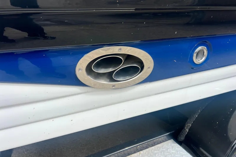Slide: The Image of Close-up of 2018 Crownline 285 SS boat exhaust and hull detailing. - 8