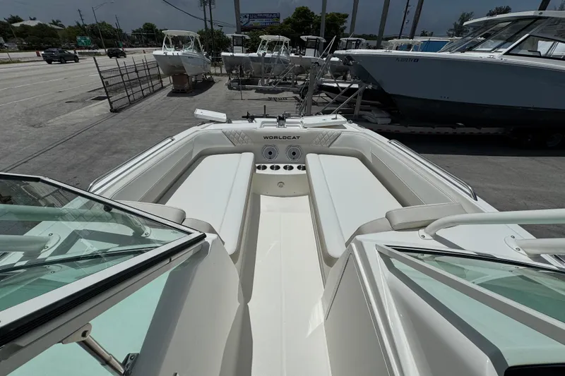 Slide: The Image of 2026 World Cat 230 SD boat interior with spacious seating and modern design. - 14