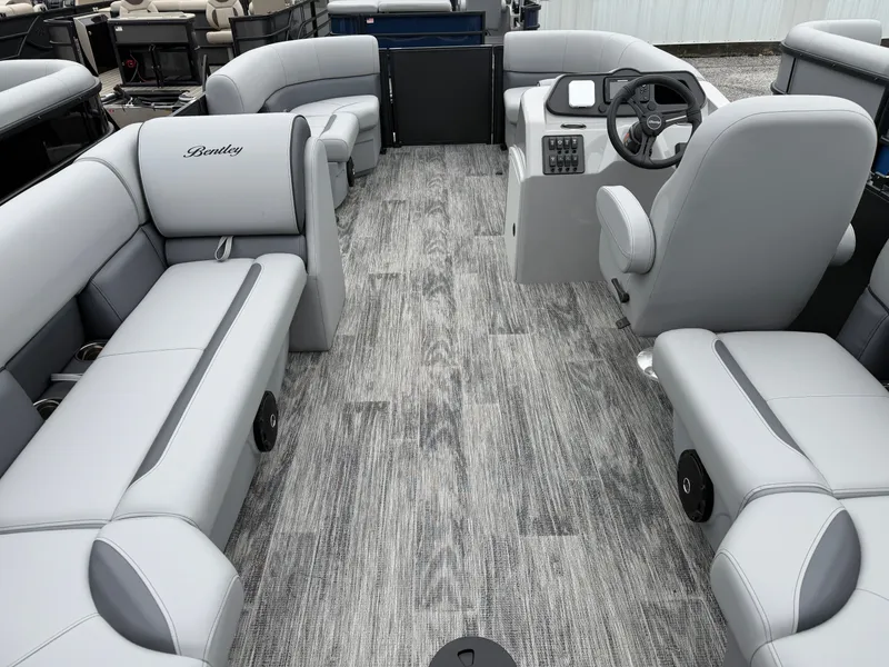 Slide: The Image of Interior of 2026 Bentley Pontoons BOLT 200 with gray seating. - 5