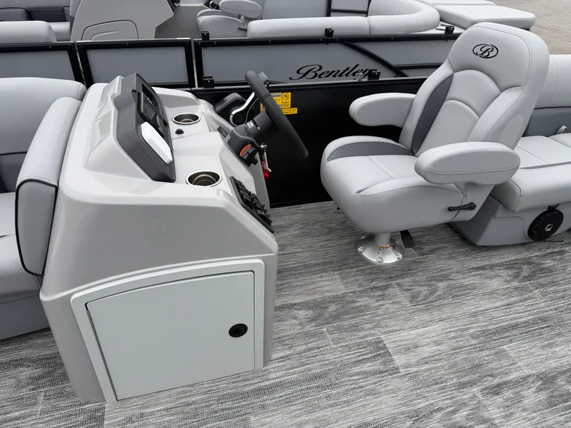 Slide: The Image of Interior of 2026 Bentley Pontoons BOLT 200 with gray leather seating. - 7