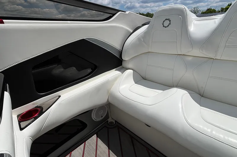 Slide: The Image of Interior of 2007 Fountain 42 Lightning boat with white leather seating and sleek design. - 10