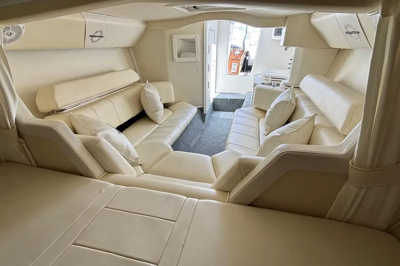 Slide: The Image of Luxurious interior of a 2007 Fountain 42 Lightning boat with cream leather seating. - 15