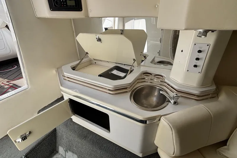Slide: The Image of 2007 Fountain 42 Lightning boat interior with kitchenette and sink. - 16