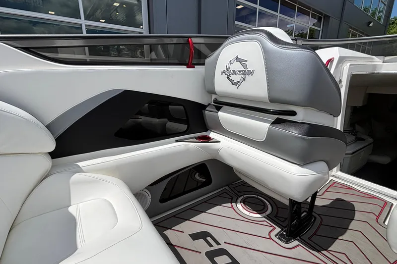 Slide: The Image of Interior of a 2007 Fountain 42 Lightning boat with white and gray seating. - 18