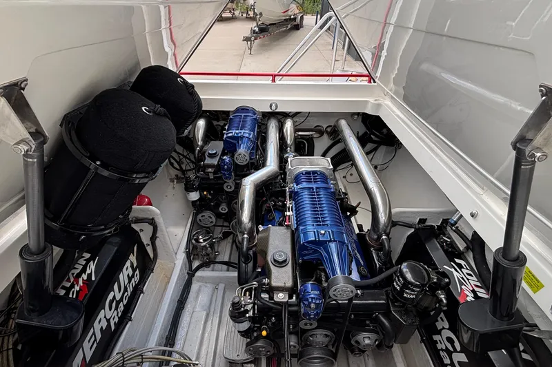 Slide: The Image of Engine compartment of a 2007 Fountain 42 Lightning boat with Mercury Racing engines. - 21