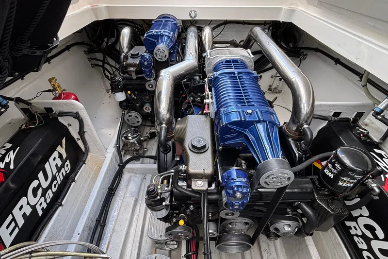 Slide: The Image of Engine compartment of a 2007 Fountain 42 Lightning boat with Mercury Racing components. - 23