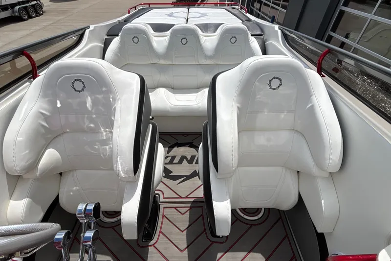 Slide: The Image of Interior of a 2007 Fountain 42 Lightning boat with white leather seats. - 34