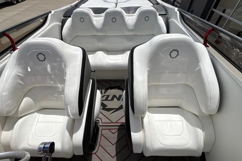 Slide: The Image of 2007 Fountain 42 Lightning boat interior with white leather seats and modern design. - 36