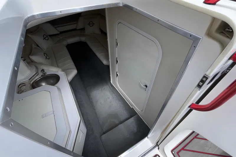 Slide: The Image of Interior cabin of 2007 Fountain 42 Lightning boat with seating and sink. - 39